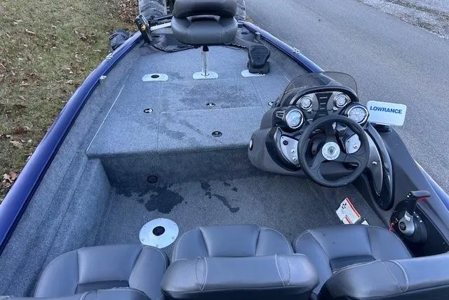 Slide: The Image of 2020 Tracker Pro Team 175 TF boat interior with steering console and seating. - 11
