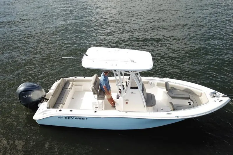 Slide: The Image of 2022 Key West 239 FS boat on water, featuring Yamaha outboard engine. - 3