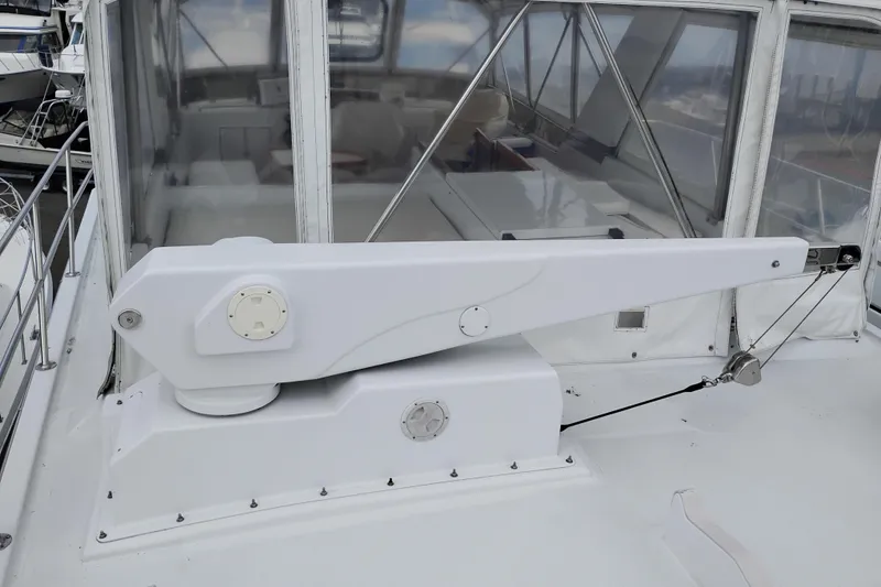 Slide: The Image of 1985 Ocean Alexander Custom Aft Deck Motoryacht with white deck equipment. - 23