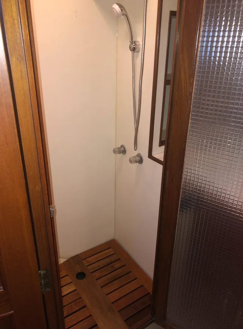 Slide: The Image of Shower area in 1985 Ocean Alexander Custom Aft Deck Motoryacht with wooden floor. - 35
