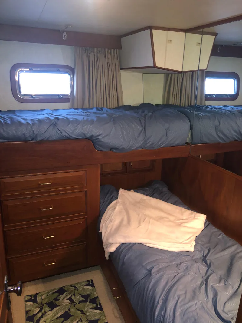 Slide: The Image of Cozy cabin with bunk beds in 1985 Ocean Alexander Custom Aft Deck Motoryacht. - 36
