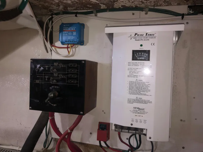 Slide: The Image of Electrical panel and charger in 1985 Ocean Alexander Custom Aft Deck Motoryacht. - 51