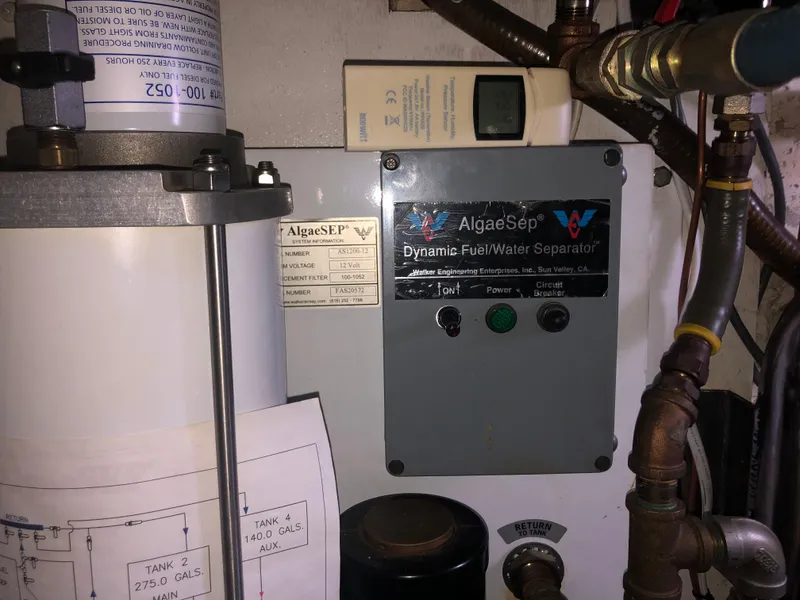 Slide: The Image of AlgaeSep dynamic fuel/water separator in 1985 Ocean Alexander Custom Aft Deck Motoryacht engine room. - 52