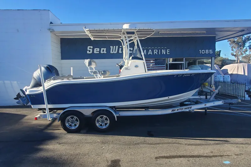 The Image of 2023 NauticStar 2102 Legacy boat on trailer at Sea Witch Marine dealership. - 0