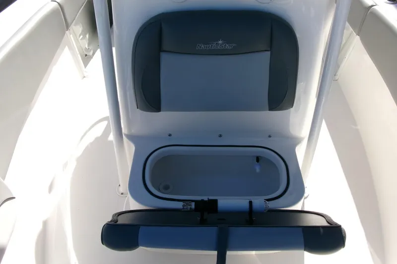 Slide: The Image of 2023 NauticStar 2102 Legacy boat seat with storage compartment open. - 13