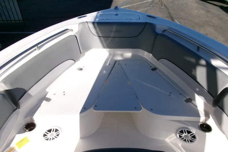 Slide: The Image of 2023 NauticStar 2102 Legacy boat interior with spacious seating and modern design. - 9