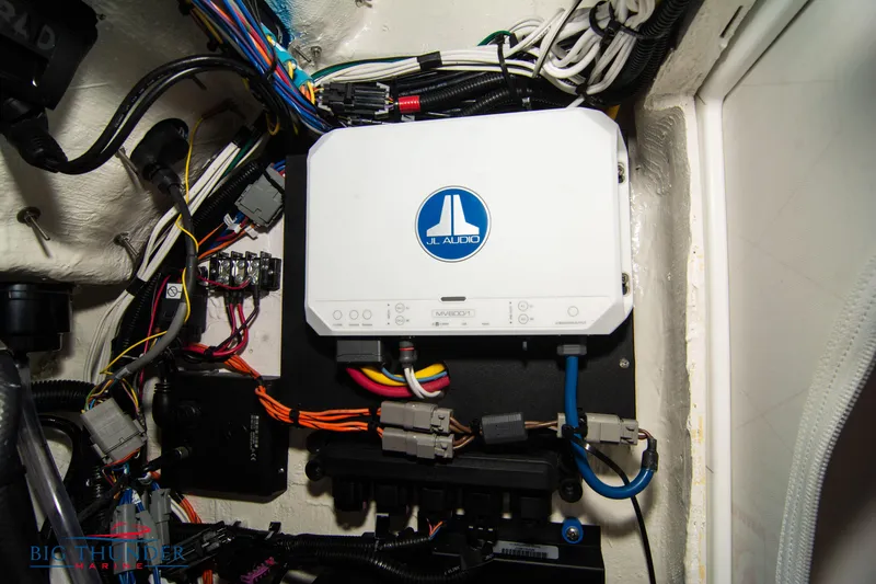 Slide: The Image of 2023 Fountain 34 Center Console audio system wiring with JL Audio amplifier. - 26