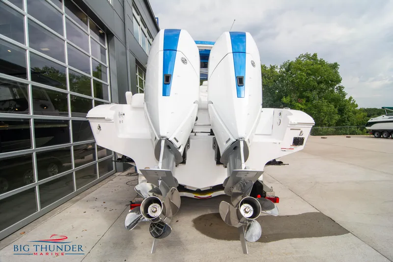 Slide: The Image of 2023 Fountain 34 Center Console boat with dual outboard engines at Big Thunder Marine. - 6