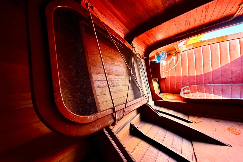 Slide: The Image of Interior of 1998 Custom 30 Gentleman's Racer with wooden finish and vintage design elements. - 35