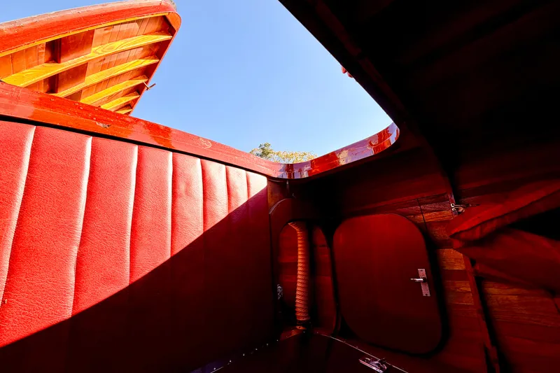 Slide: The Image of Interior of 1998 Custom 30 Gentleman's Racer with red leather and wood finish. - 39