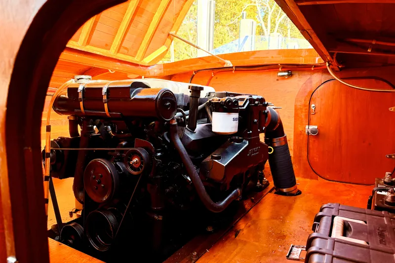 Slide: The Image of Engine compartment of 1998 Custom 30 Gentleman's Racer with wooden interior detailing. - 40