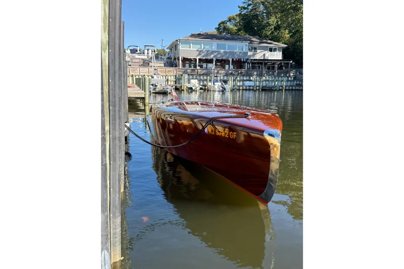 Slide: The Image of Custom 1998 30 Gentleman's Racer docked by waterfront restaurant. - 41