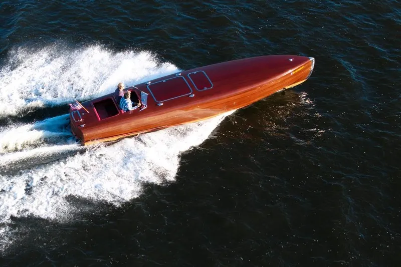 Slide: The Image of Custom 1998 30 Gentleman's Racer speedboat cruising on open water. - 9