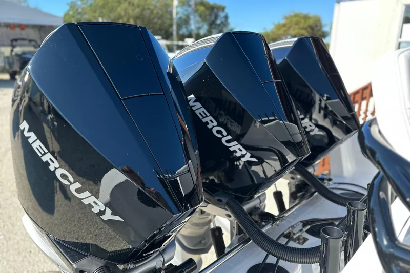 Slide: The Image of Triple Mercury outboard engines on a 2024 Fountain 34 Tournament Edition boat. - 17