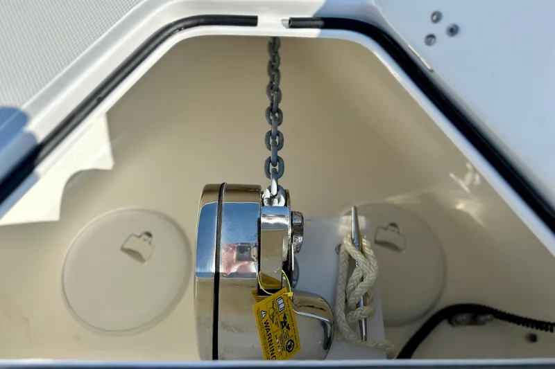 Slide: The Image of Anchor chain mechanism on 2024 Fountain 34 Tournament Edition boat. - 7