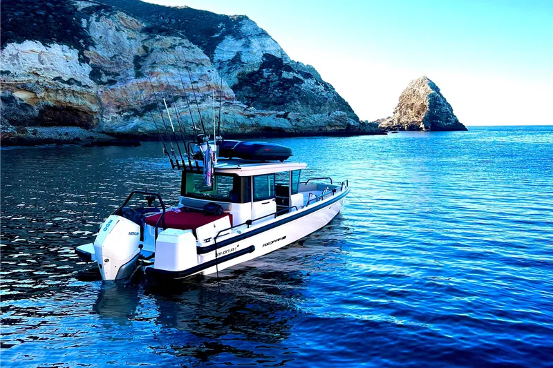 The Image of 2023 Axopar 28 Aft Cabin with Brabus Trim in scenic coastal waters. - 0