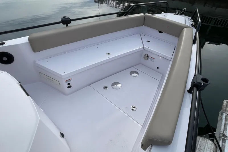 Slide: The Image of Interior of 2023 Axopar 28 Cabin with seating area. - 10