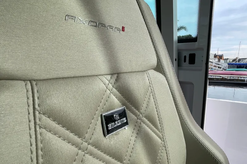 Slide: The Image of Luxurious seat detail in 2023 Axopar 28 Aft Cabin with Brabus trim. - 22