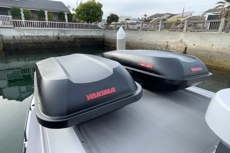 Slide: The Image of 2023 Axopar 28 Aft Cabin with Brabus Trim featuring Yakima storage boxes. - 35