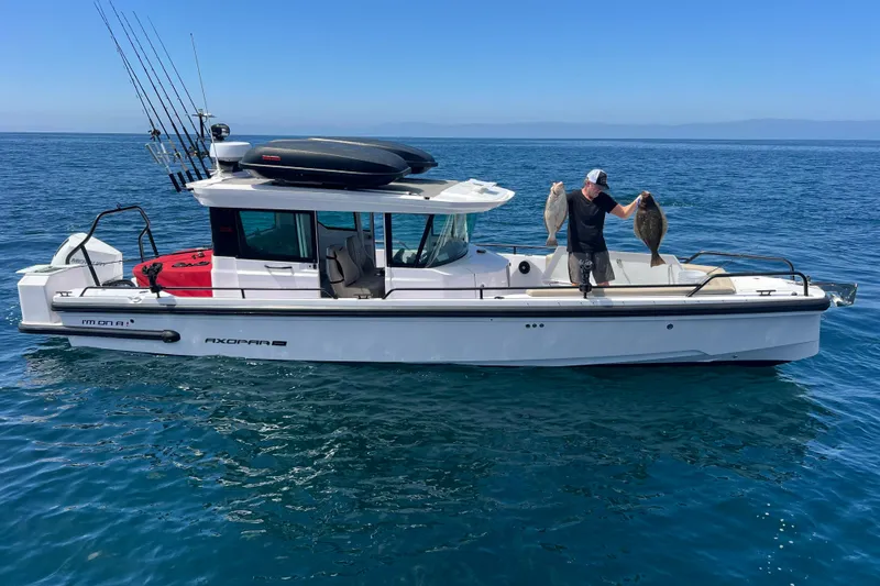 Slide: The Image of Anchor winch of 2023 Axopar 28 Cabin with chain. - 7