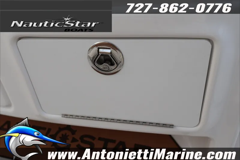 Slide: The Image of 2026 NauticStar 222 Offshore boat compartment with logo and contact details. - 19