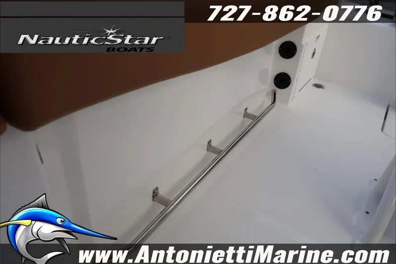 Slide: The Image of 2026 NauticStar 222 Offshore boat interior with branding and contact details. - 31