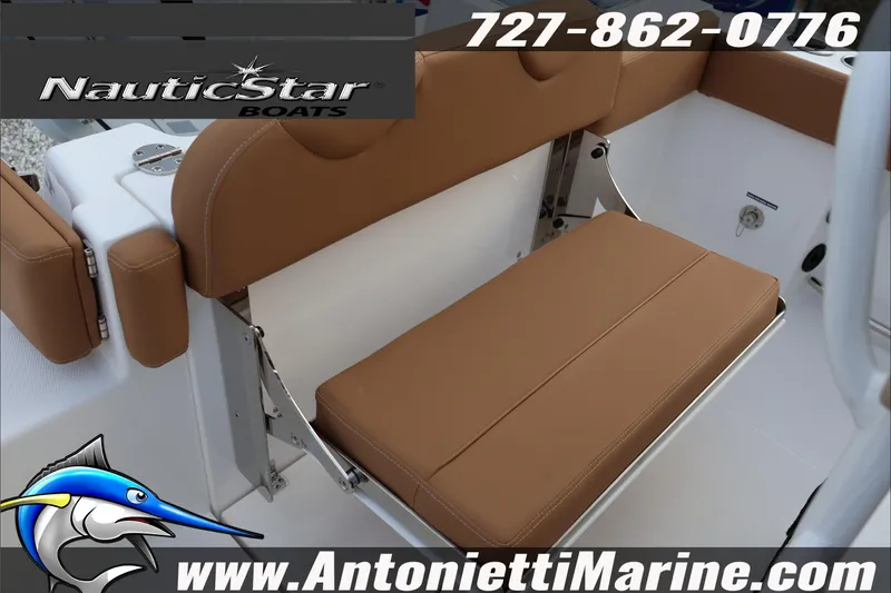 Slide: The Image of 2026 NauticStar 222 Offshore boat seat with brown cushions, featuring contact details and logo. - 33