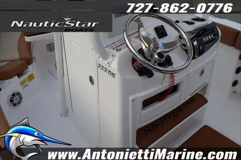 Slide: The Image of 2026 NauticStar 222 Offshore boat interior with steering wheel and controls, Antonietti Marine branding. - 36