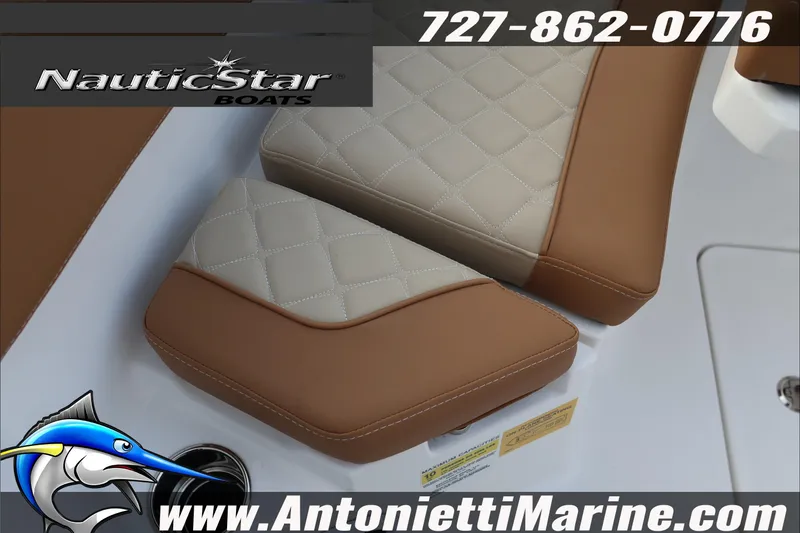 Slide: The Image of 2026 NauticStar 222 Offshore boat seats with brown and beige upholstery. - 39