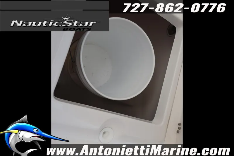 Slide: The Image of 2026 NauticStar 222 Offshore boat detail with contact info and logo. - 43