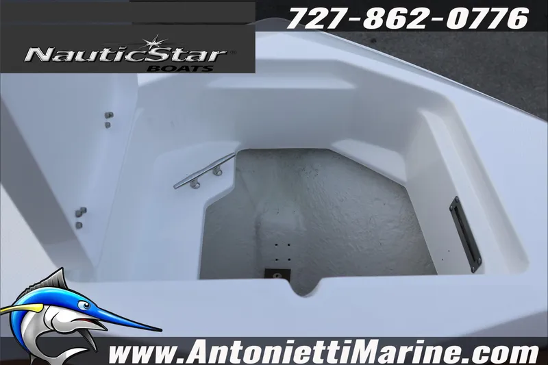 Slide: The Image of 2026 NauticStar 222 Offshore boat interior detail, featuring storage compartment. - 45