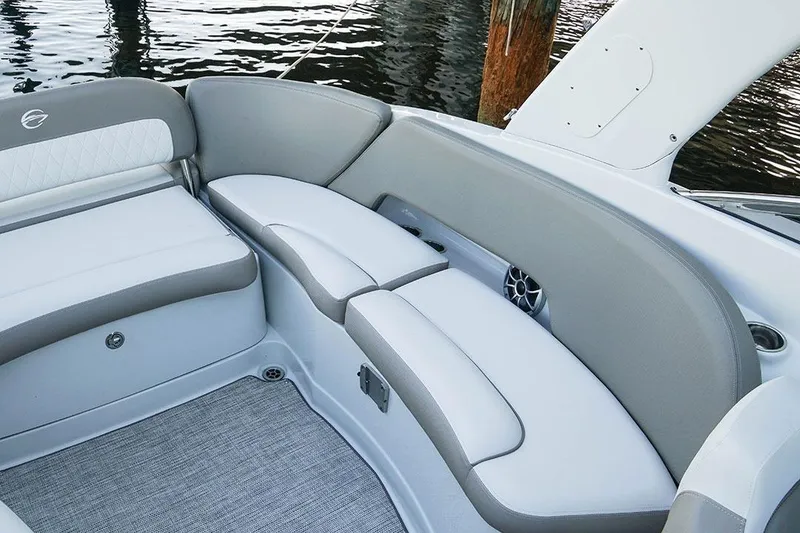 Slide: The Image of Luxurious seating on 2026 Crownline 288 SS boat, featuring elegant gray and white upholstery. - 12