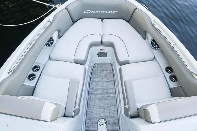 Slide: The Image of 2026 Crownline 288 SS boat interior with luxurious seating and cup holders. - 13