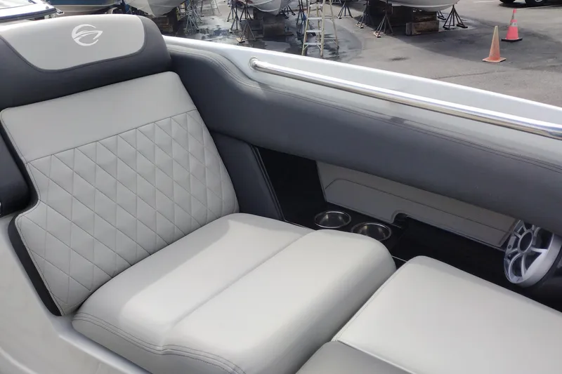 Slide: The Image of Luxurious seating in 2026 Crownline 288 SS boat with elegant design and cup holders. - 18