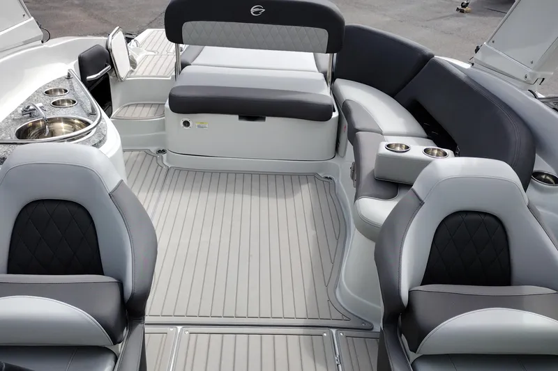Slide: The Image of 2026 Crownline 288 SS boat interior with luxurious seating and built-in amenities. - 20