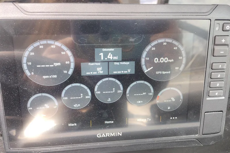 Slide: The Image of Garmin display showing Crownline 288 SS 2026 boat dashboard with odometer and gauges. - 28