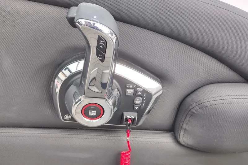 Slide: The Image of Throttle control panel of a 2026 Crownline 288 SS boat with start/stop button. - 34