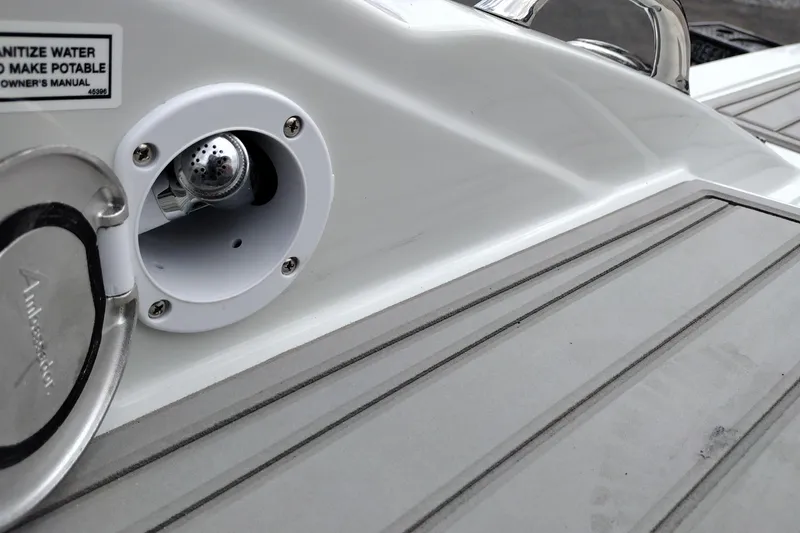Slide: The Image of 2026 Crownline 288 SS boat deck with water sanitation system detail. - 43
