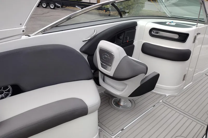 Slide: The Image of 2026 Crownline 288 SS boat interior with sleek seating and modern design. - 49