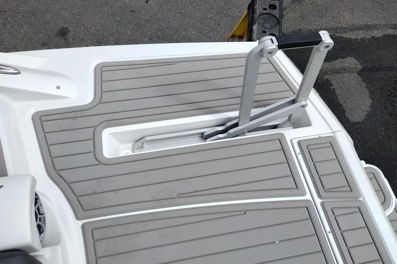 Slide: The Image of 2026 Crownline 288 SS boat swim platform with retractable ladder. - 56