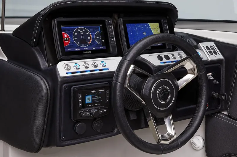 Slide: The Image of 2026 Crownline 288 SS dashboard with Garmin displays and modern steering wheel. - 9