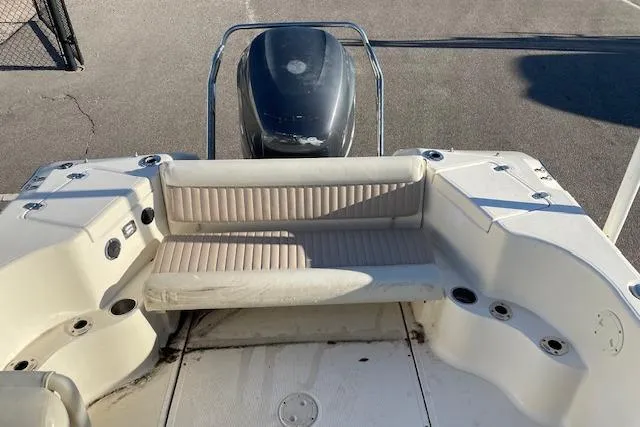 Slide: The Image of 2005 Scout 205 Dorado boat with seating and outboard motor, viewed from above. - 10