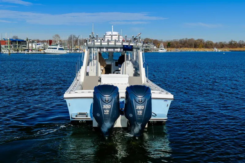 Slide: The Image of 2024 Steiger Craft 31 Fisherman with dual 300 V6 engines on the water. - 4