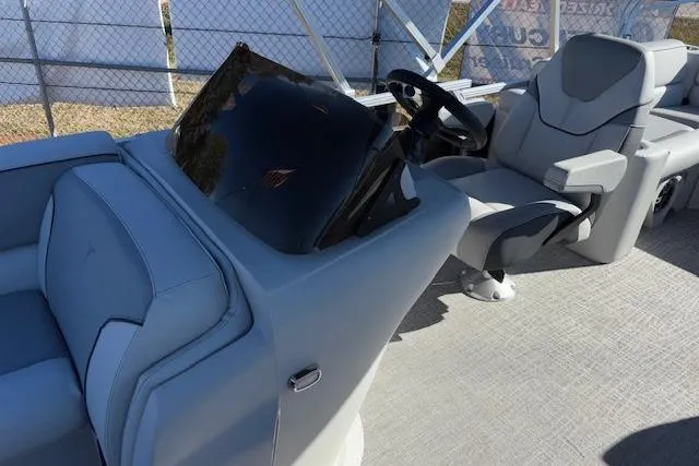 Slide: The Image of 2026 Tahoe Pontoon SP 2385 EL interior with modern helm and seating. - 10