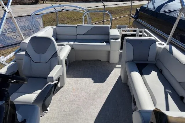 Slide: The Image of 2026 Tahoe Pontoon SP 2385 EL interior with spacious seating and modern design. - 12