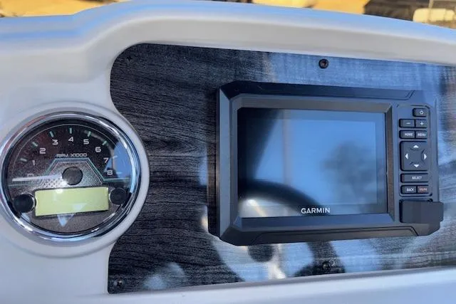 Slide: The Image of Dashboard of 2026 Tahoe Pontoon SP 2385 EL with Garmin display and tachometer. - 15