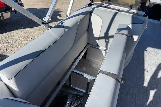 Slide: The Image of 2026 Tahoe Pontoon SP 2385 EL interior seating with storage compartment. - 20