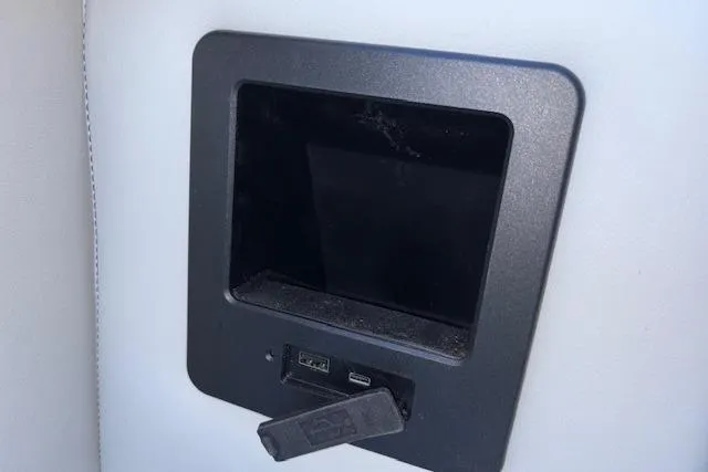 Slide: The Image of USB and HDMI ports on 2026 Tahoe Pontoon SP 2385 EL interior panel. - 25