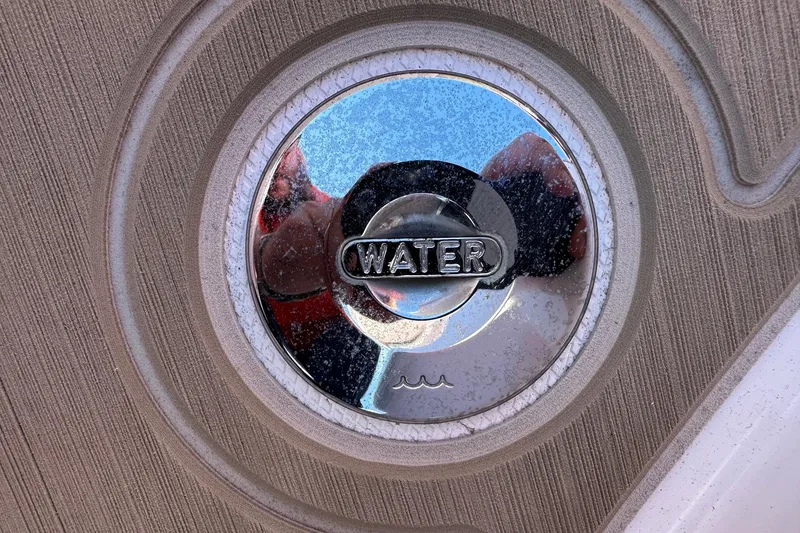 Slide: The Image of Water cap on 2022 Axopar 28 CABIN boat, reflecting surroundings. - 43