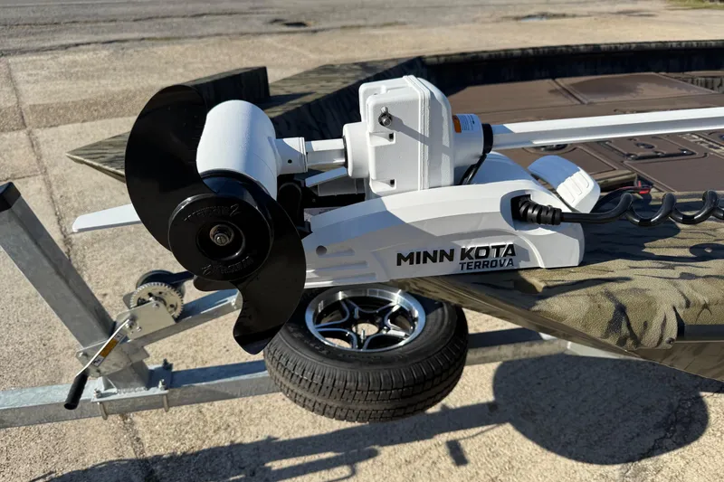 Slide: The Image of Minn Kota Terrova motor on 2026 SeaArk 1960 Slayer Pro boat, trailer visible. - 11